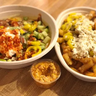 Hummus Bowl with Falafel, Spicy Feta (the little cup in the middle), and Greek Fries