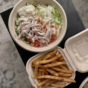 Beef and lamb rice bowl with side of fries