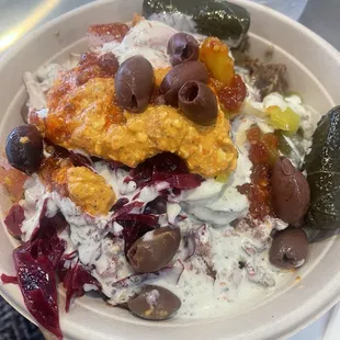 Beef and lamb  Basmati Rice Bowl Cucumber Yogurt Stuffed Grape Leaves (5) (v) Spicy Feta Extra Hot Sauce Extra Tzatziki Sauce