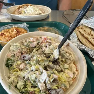 Hummus/rice bowl, spicey feta and pita with lamb.