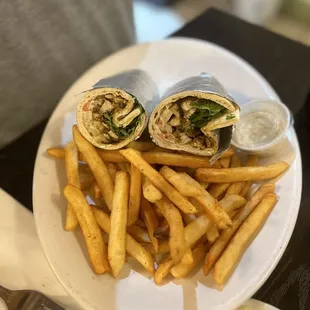 a plate of french fries and a burrito