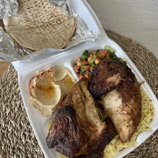 Rotisserie chicken plate with two white meat quarters