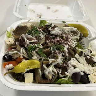 Take out box of their Greek salad. Really good. My new go to for Greek salads!