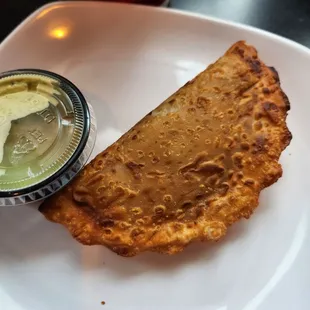 Breakfast egg empanada was amazing. That sauce also amazing