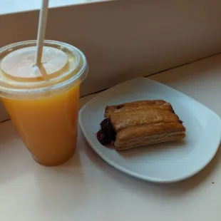 Fresh squeezed orange juice and guava and cheese pastry
