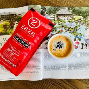 a coffee bag and a cup of coffee