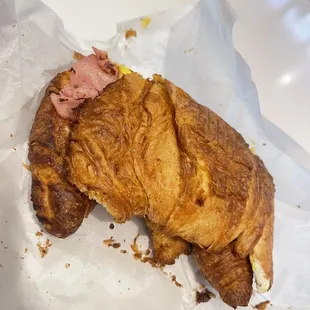 a half eaten croissant