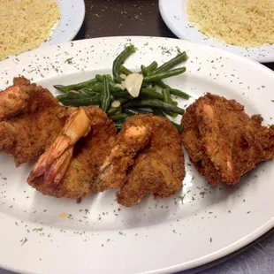 Fried gigantic shrimp! Look at your hand and that&apos;s how big the shrimp are. You still 3-4 per pound and cooked exactly how you like it!!