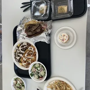 Greek Fries, side salads, combo steak/chicken shawarma plate, Gyro wrap, baklava, and vanilla cupcake. All we&apos;re delish!