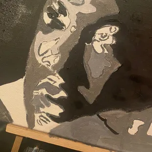 a close up of a painting of a man&apos;s face