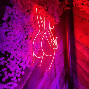 a neon sign of a horse