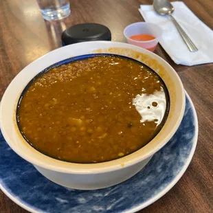 a bowl of soup on a plate