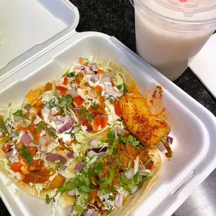 Fish tacos, pastor taco, horchata