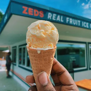 Vanilla ice cream in a sugar cone