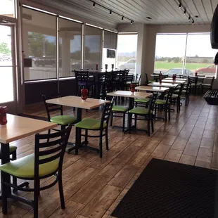 a restaurant with tables and chairs