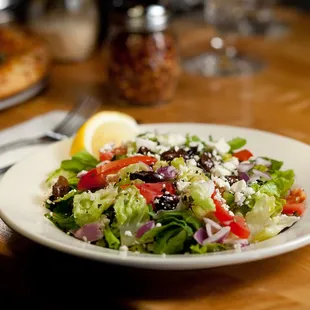 a plate of salad on a table