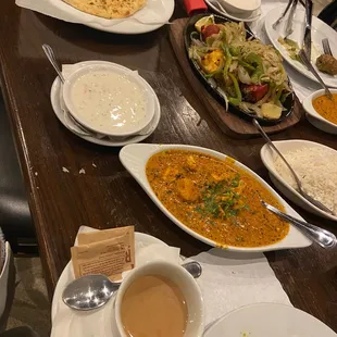 Rosemary naan, raita, tandoori mixed platter, and chicken tikka masala