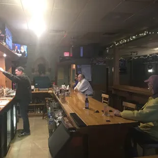 people sitting at the bar