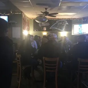 a group of people sitting at a table