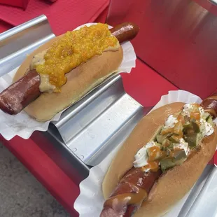 The deli dog with relish and the spicy pickle