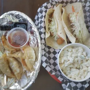 Fish tacos, pasta salad and pot stickers. Good tasting food for a reasonable price.