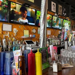 a bar with televisions