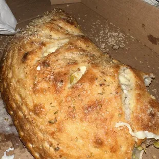 Calzone with sausage and banana peppers