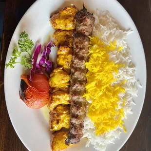 Ground chicken kebab (Called Koobideh) -- Two skewers of ground chicken marinated and chargrilled.