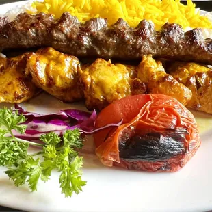 Ground chicken kebab (Called Koobideh) -- Two skewers of ground chicken marinated and chargrilled...zoom