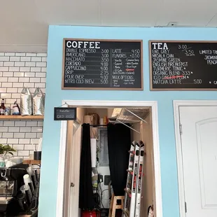 menus on the wall of a coffee shop