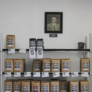 rack of coffee bean packets sold