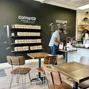 a man working in a coffee shop