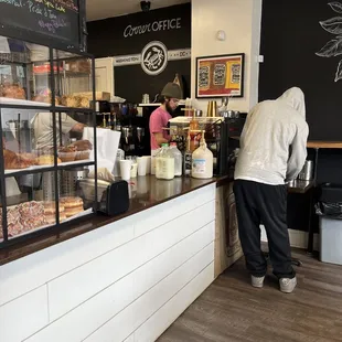 a person standing at the counter
