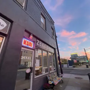  bench in front of a restaurant