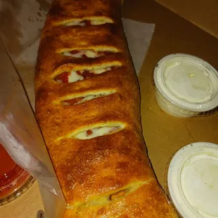 Ham and pepperoni stromboli. She&apos;s so beautiful
