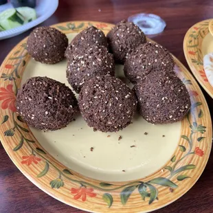Large falafel plate $12 - came with twelve, but we'd eaten four.