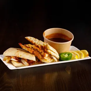 BBQ Chicken Panini with our house BBQ (with a little jalapeno and lemon)