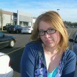 Lindsay R.