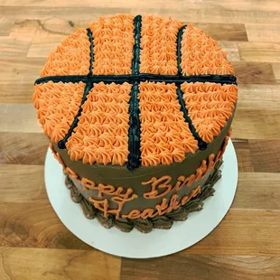 a birthday cake with a basketball theme