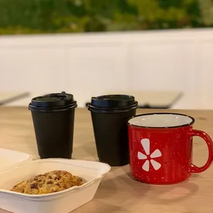 two cups of coffee and a bowl of oatmeal