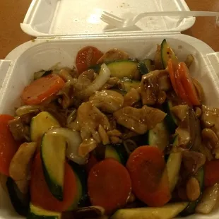 Kung pao chicken (dark meat) over noodles