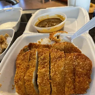 Close up of my 2X chicken katsu, rice and curry.    (Sorry about my fork).
