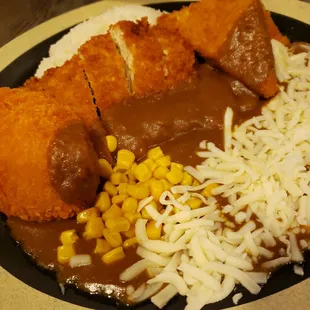 Chicken Katsu, potato croquet, tofu Katsu, cheese and corn topping!