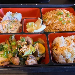 a bento box of food