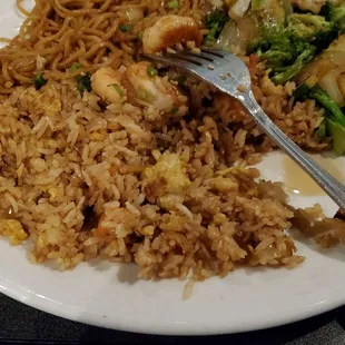 Half-eaten hibachi shrimp dinner.