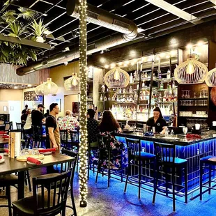 people sitting at the bar