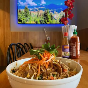 a bowl of asian food