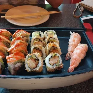 Sexy cowgirl roll on left and crunchy roll on the right.