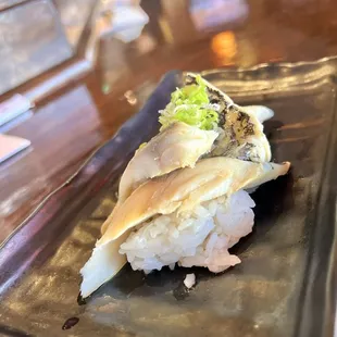 Mackerel Sushi. Fishy, but the green onion helped to tone down the flavor.