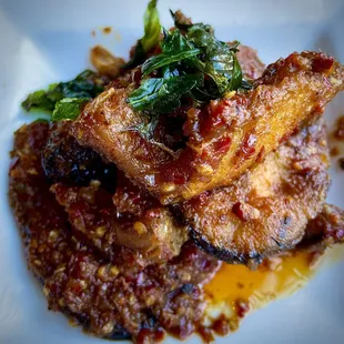 Bone in catfish with spicy sauce